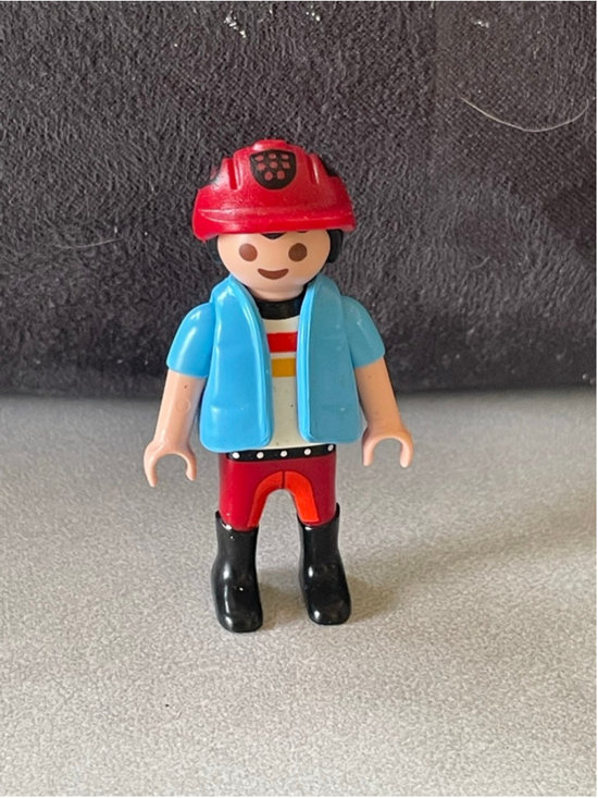 Playmobil Other - PLAYMOBIL action figure wearing a red helmet and a blue vest